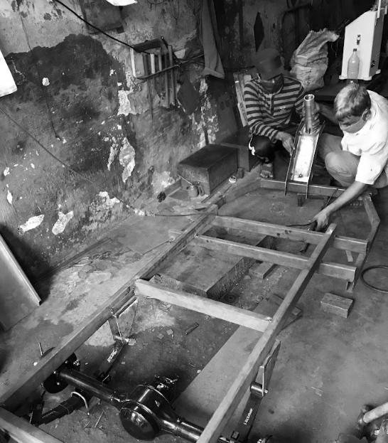The first prototype going together at a local fabricator with a Chinese powertrain.