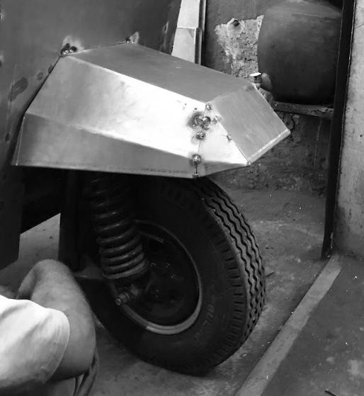Sheet metal folded by hand — the metal origami moment that changed how the vehicle was drawn.