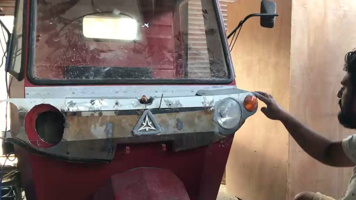 The headlight housing being fitted to the vehicle front on a jig