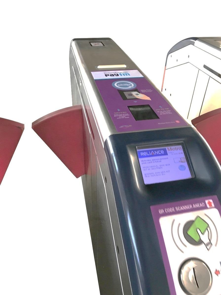 The Ridlr validator on a Mumbai Metro gate, screen lit