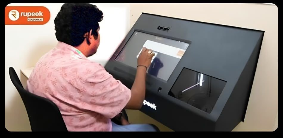 A person at the black kiosk prototype, touching the screen